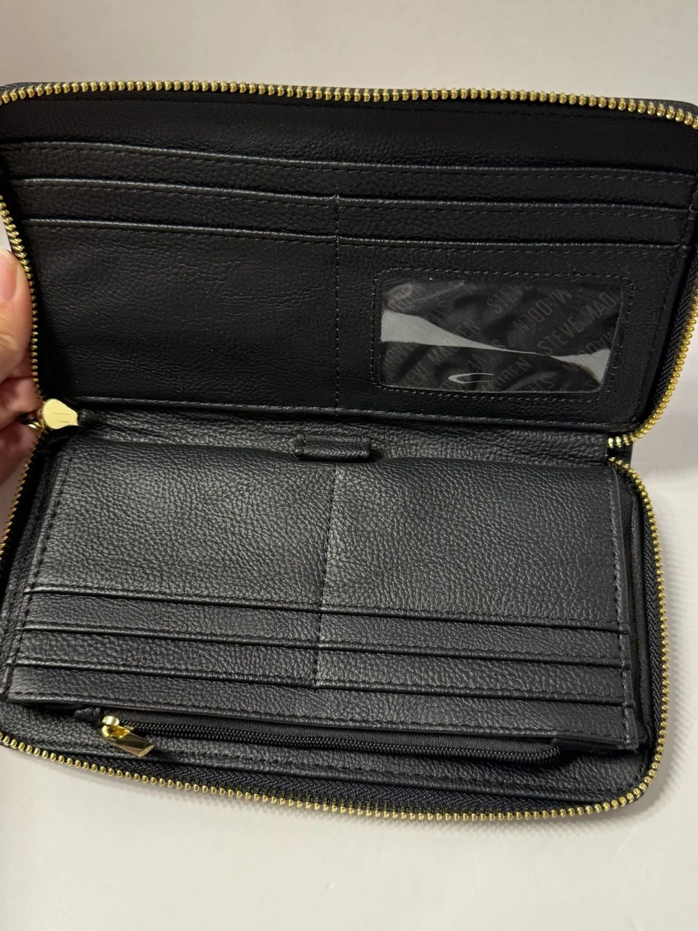 Steve Madden Black Zip-Around Wristlet with Gold Bar
